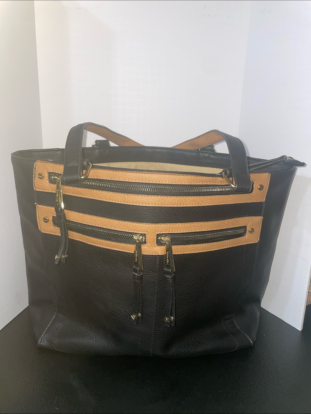 Dolce Vita Black and Tan Shoulder Tote with Front Zip Detail